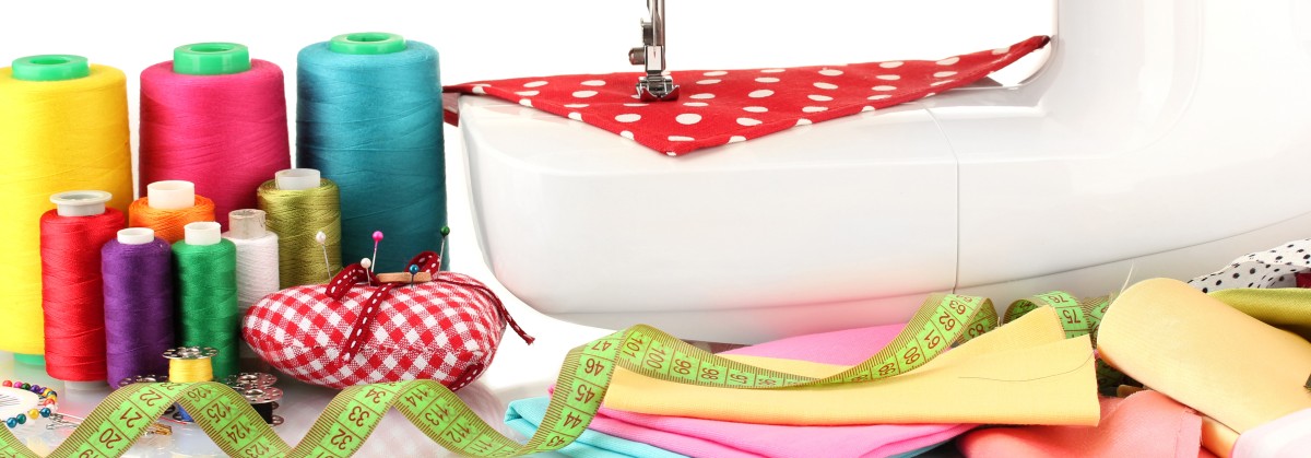 Sewing_Gestaltungsbilder_Naehmaschine_garne_Massband_shutterstock_123399829